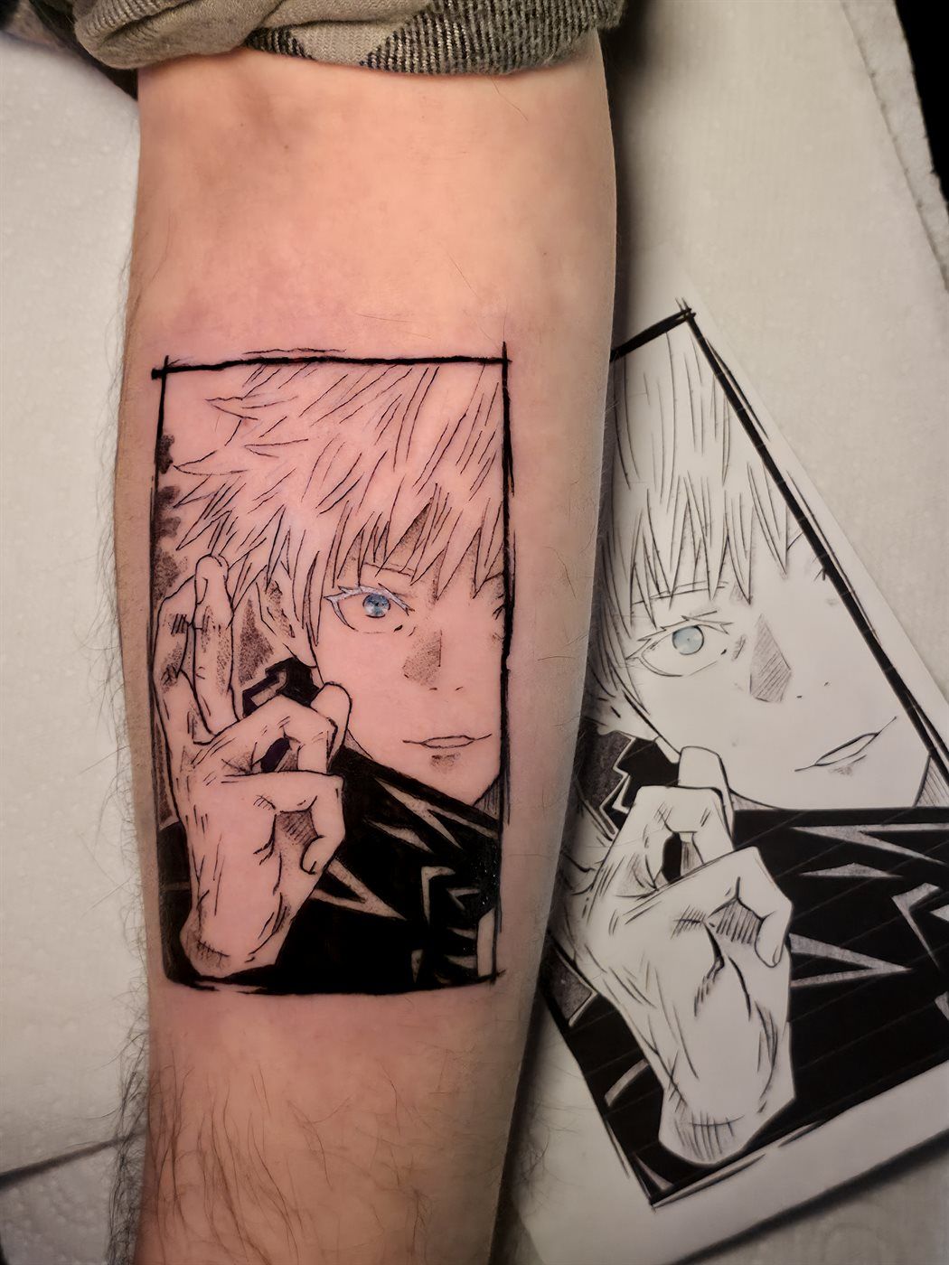 GOJO PANEL tattoo — anime, forearm — by Kayleigh Chaos, tattoo artist in Perth, Scotland