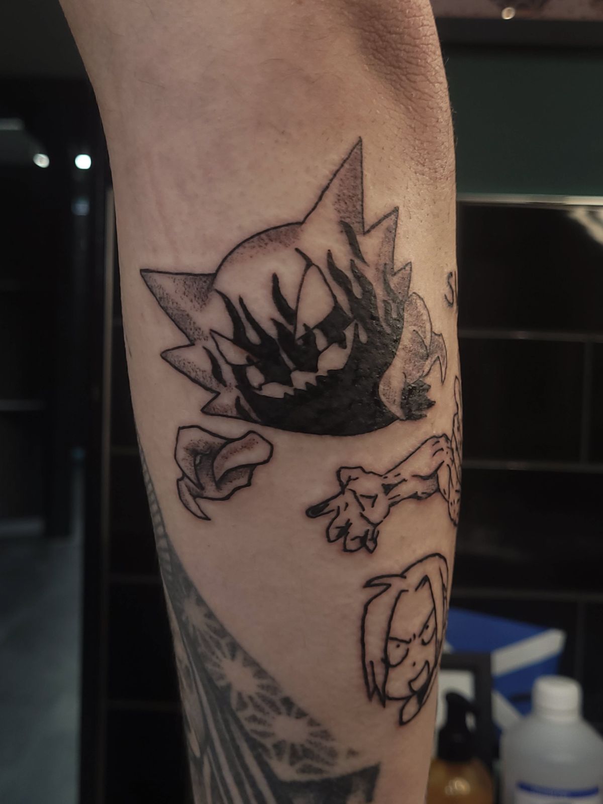 HAUNTER tattoo — anime, arm — by Kayleigh Chaos, tattoo artist in Perth, Scotland