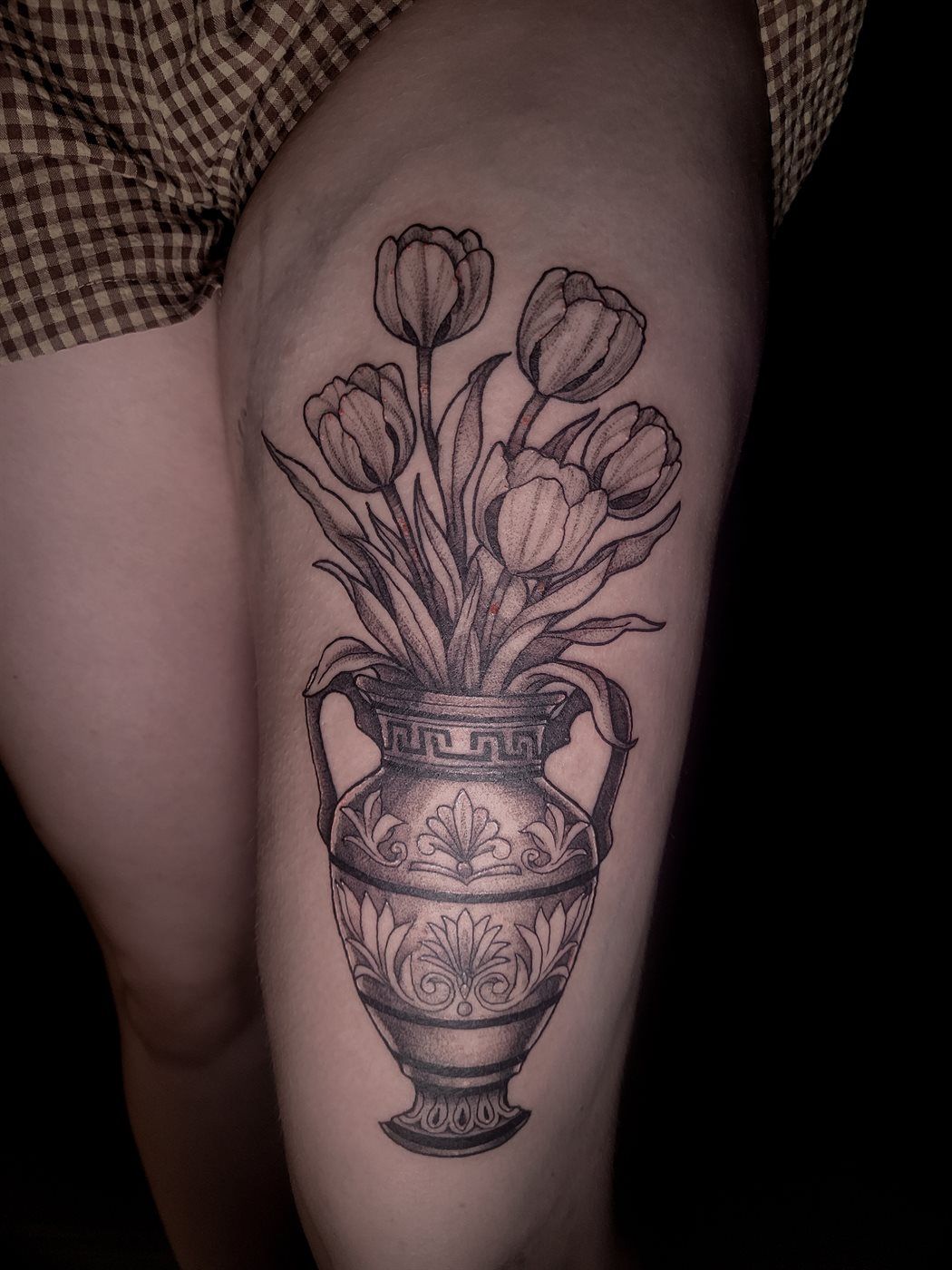 TULIP VASE tattoo — black & grey, thigh — by Kayleigh Chaos, tattoo artist in Perth, Scotland