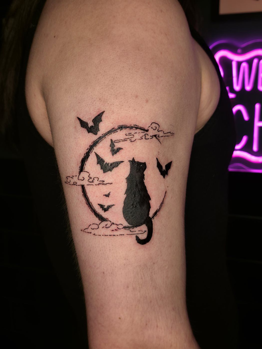 CAT + MOON tattoo — blackwork, upper arm — by Kayleigh Chaos, tattoo artist in Perth, Scotland