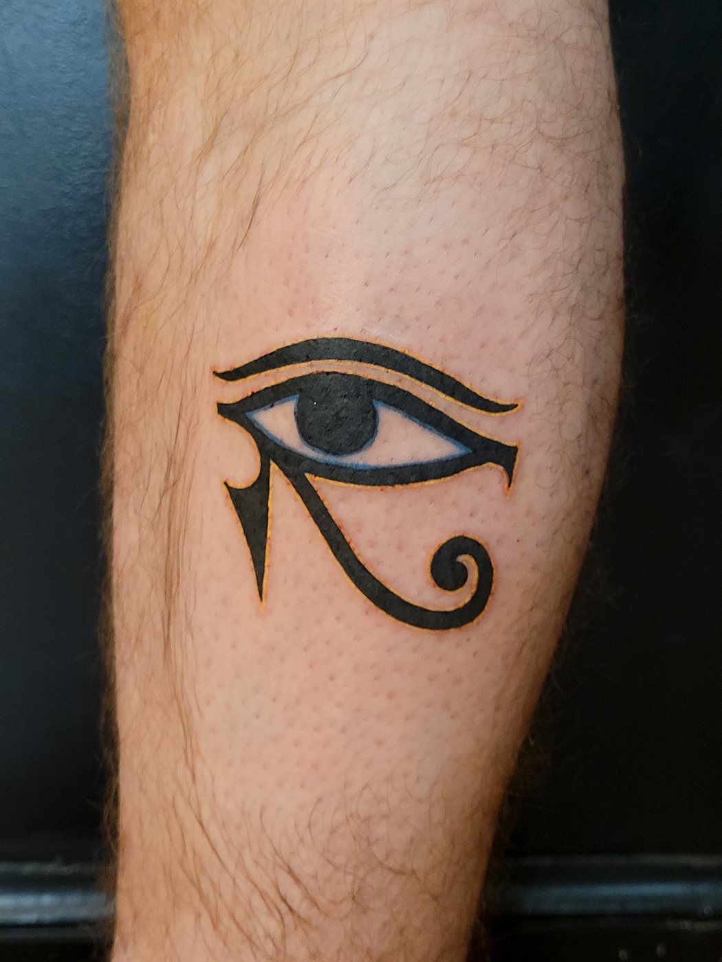 EYE OF HORUS ×2 tattoo — blackwork, both calves — by Kayleigh Chaos, tattoo artist in Perth, Scotland