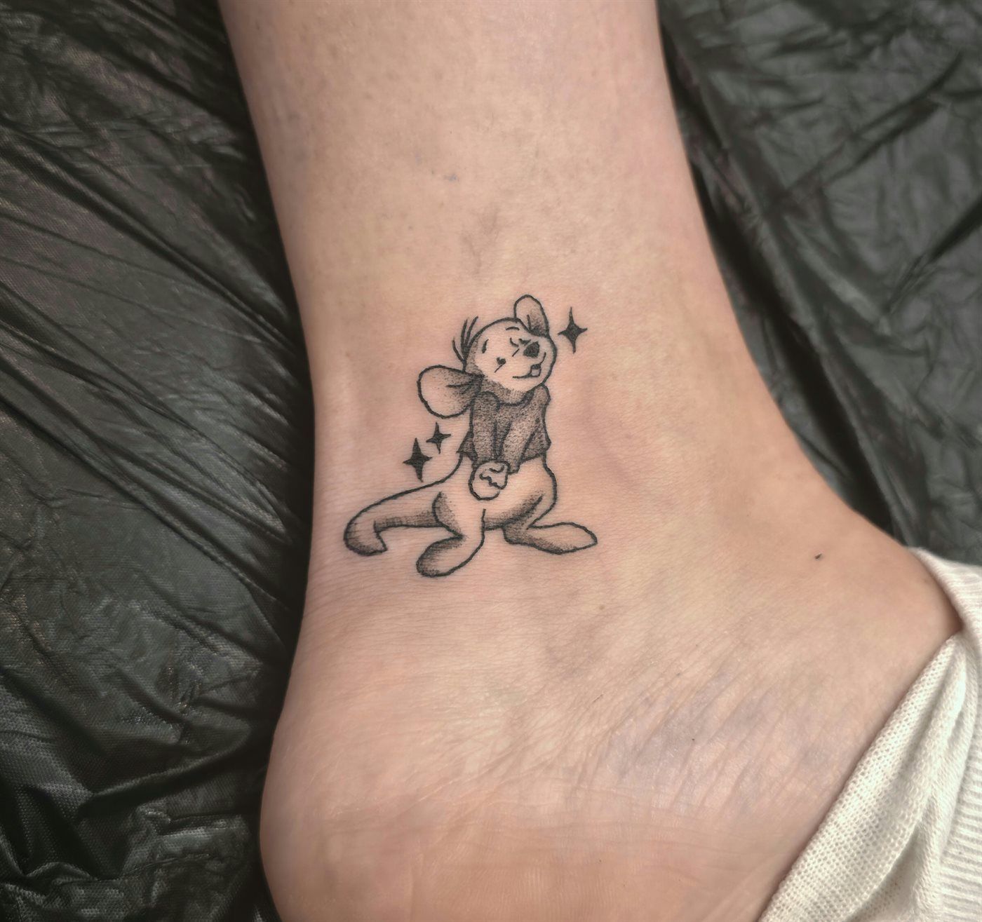 ROO tattoo — cartoon, ankle — by Kayleigh Chaos, tattoo artist in Perth, Scotland