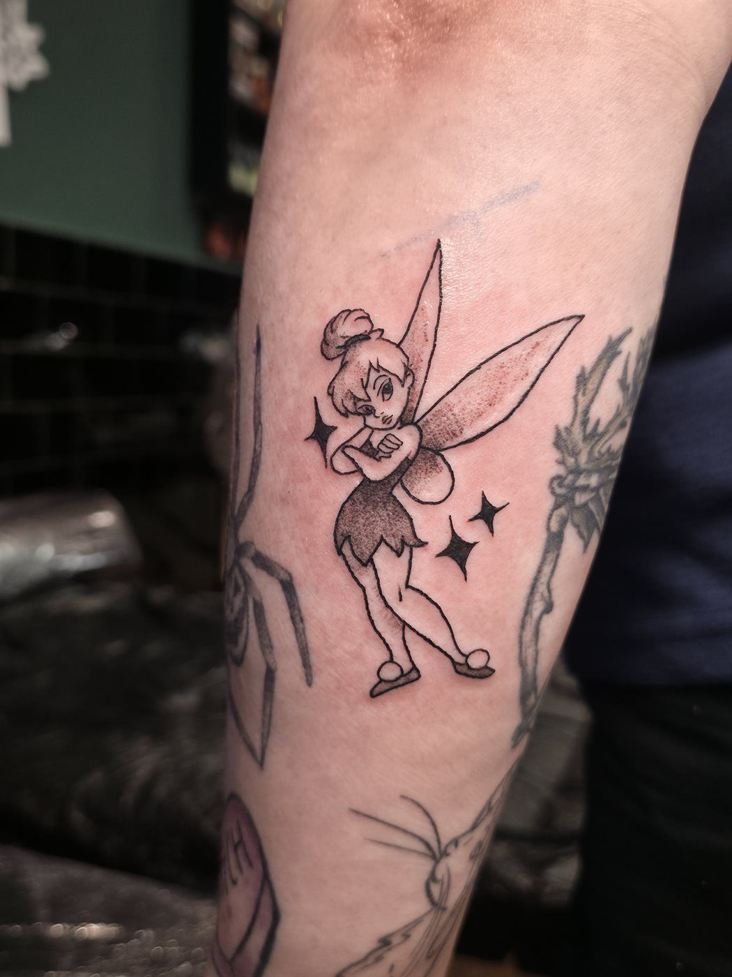 TINKERBELL II tattoo — cartoon, forearm — by Kayleigh Chaos, tattoo artist in Perth, Scotland
