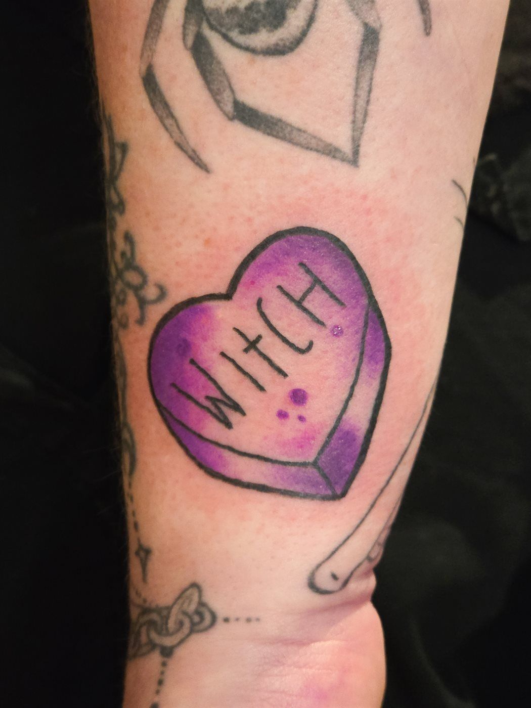 WITCH HEART tattoo — colour, wrist — by Kayleigh Chaos, tattoo artist in Perth, Scotland