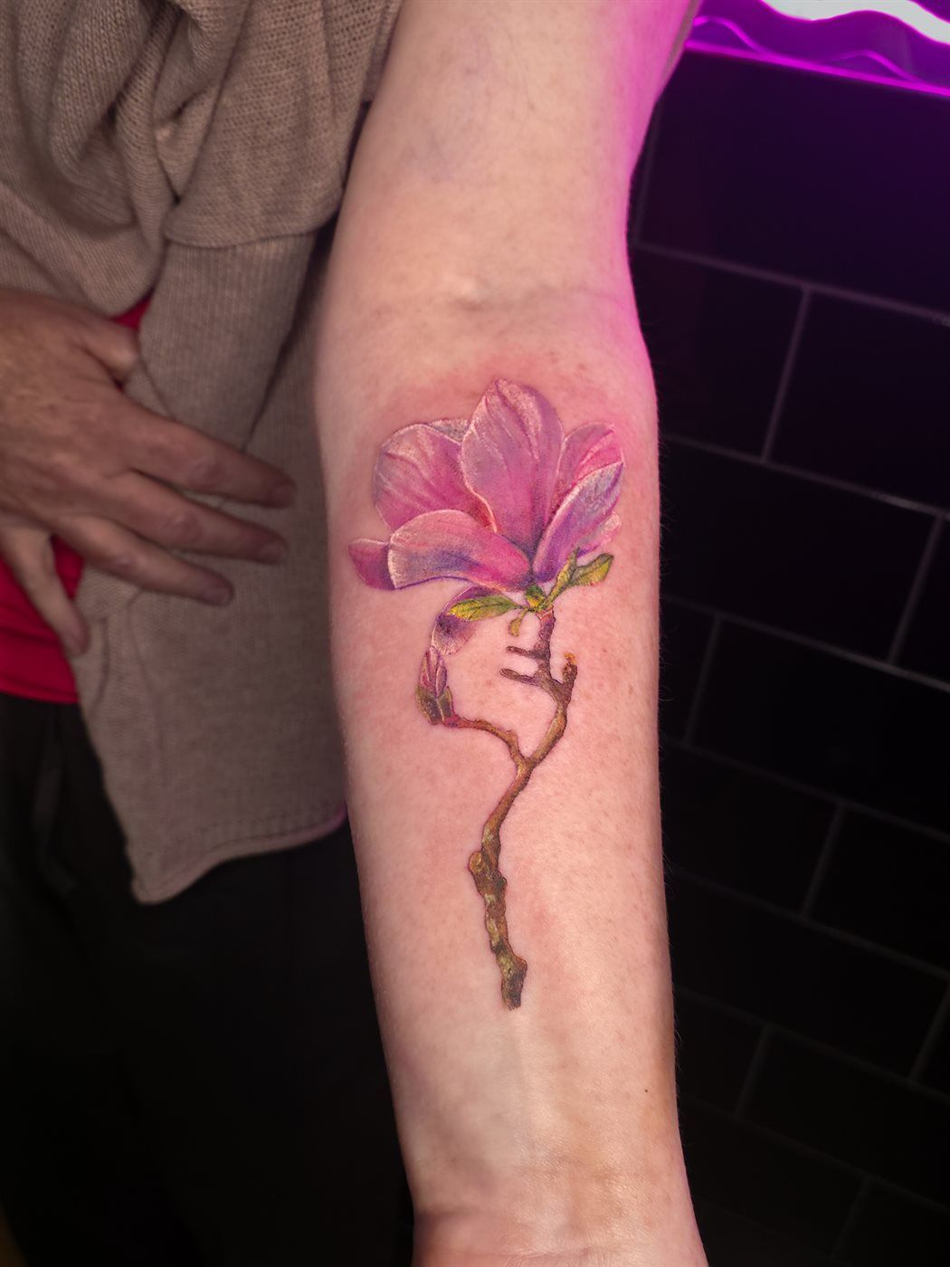 MAGNOLIA tattoo — colour realism, upper arm — by Kayleigh Chaos, tattoo artist in Perth, Scotland
