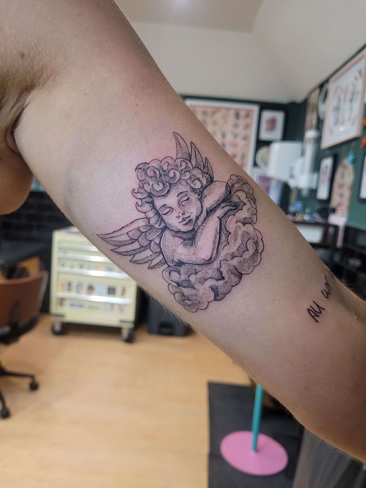 CHERUB tattoo — fine line, arm — by Kayleigh Chaos, tattoo artist in Perth, Scotland