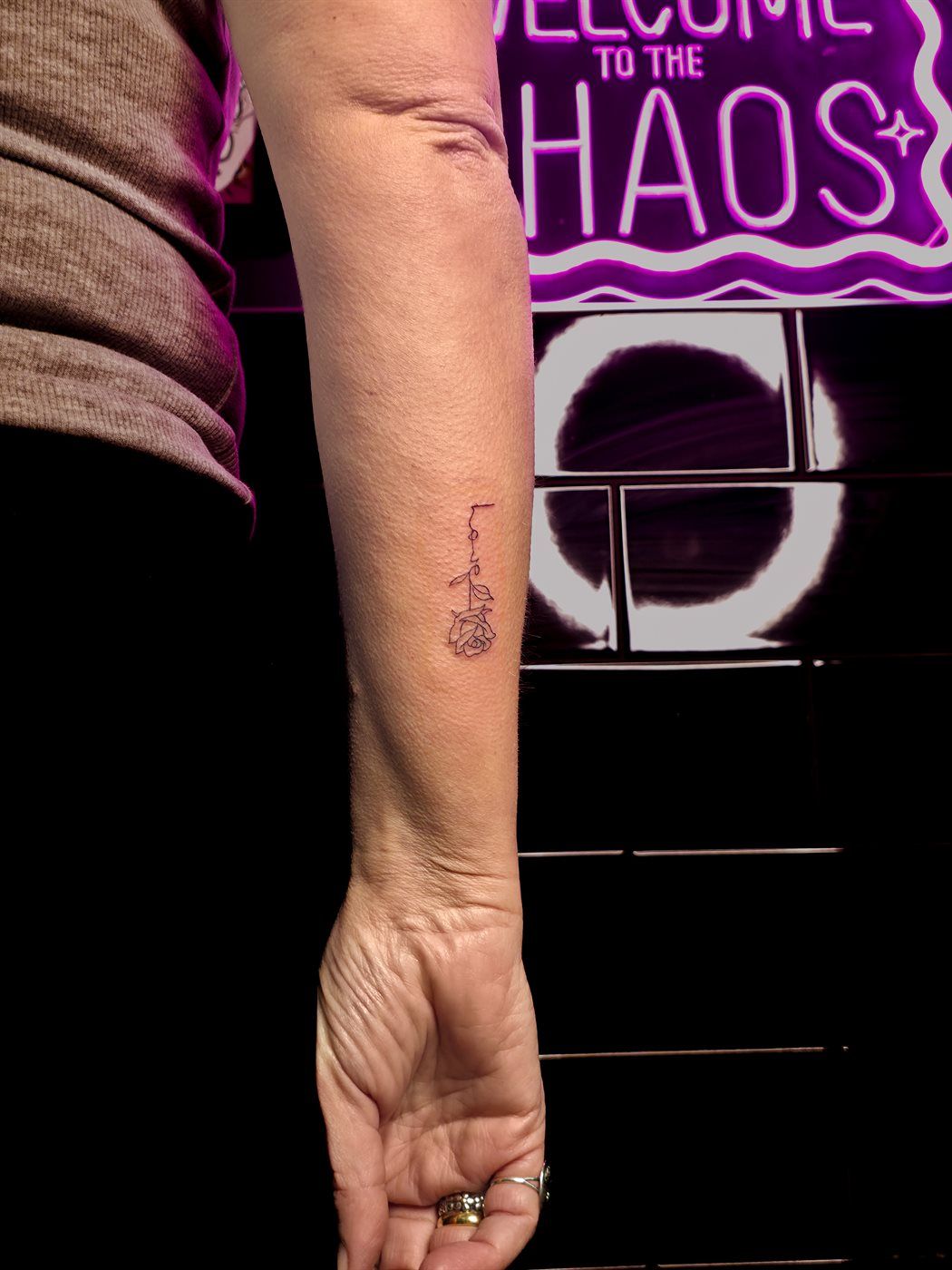 ROSE + SCRIPT tattoo — fine line, forearm — by Kayleigh Chaos, tattoo artist in Perth, Scotland