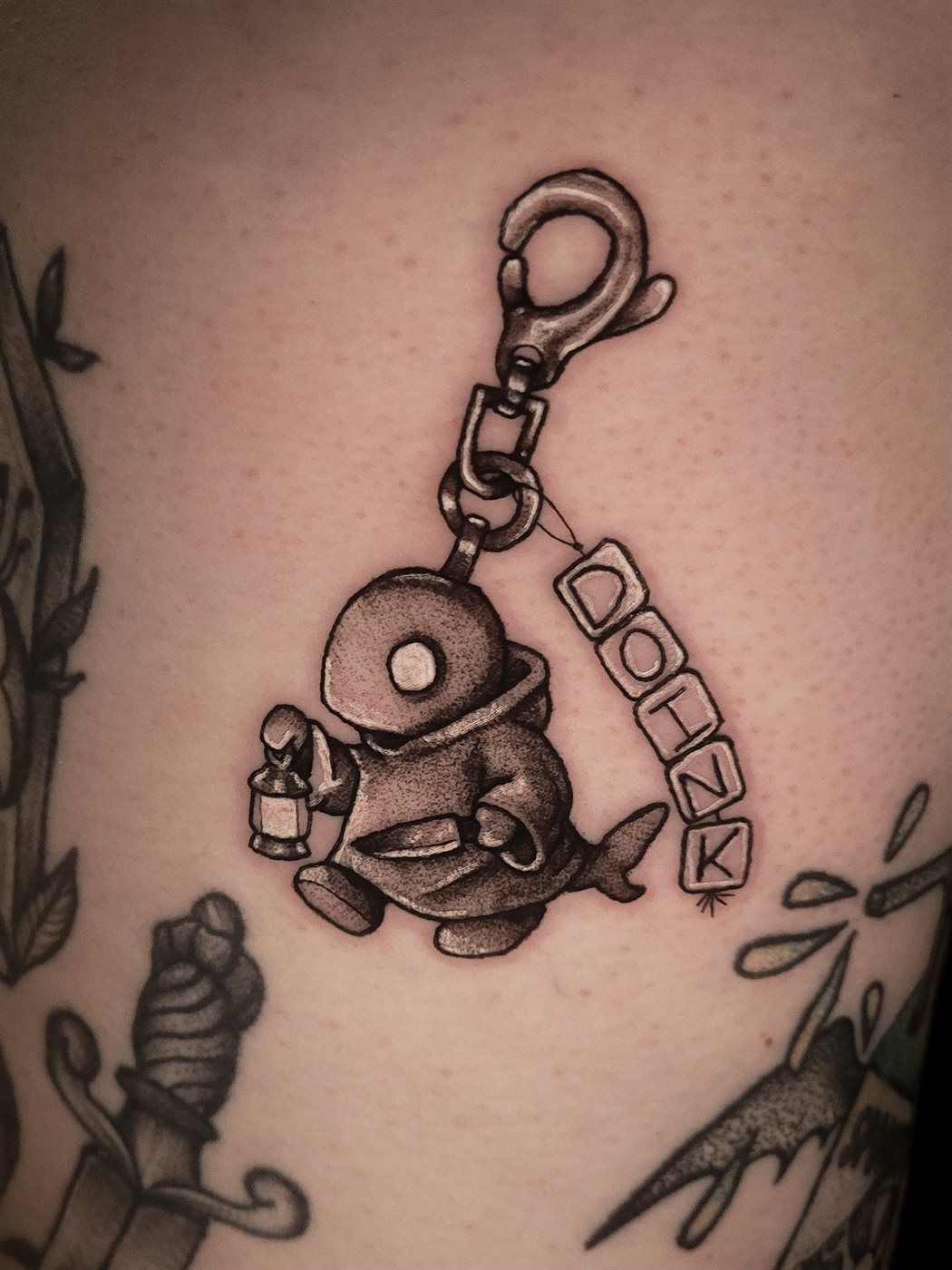 TONBERRY KEYCHAIN tattoo — gaming, thigh — by Kayleigh Chaos, tattoo artist in Perth, Scotland