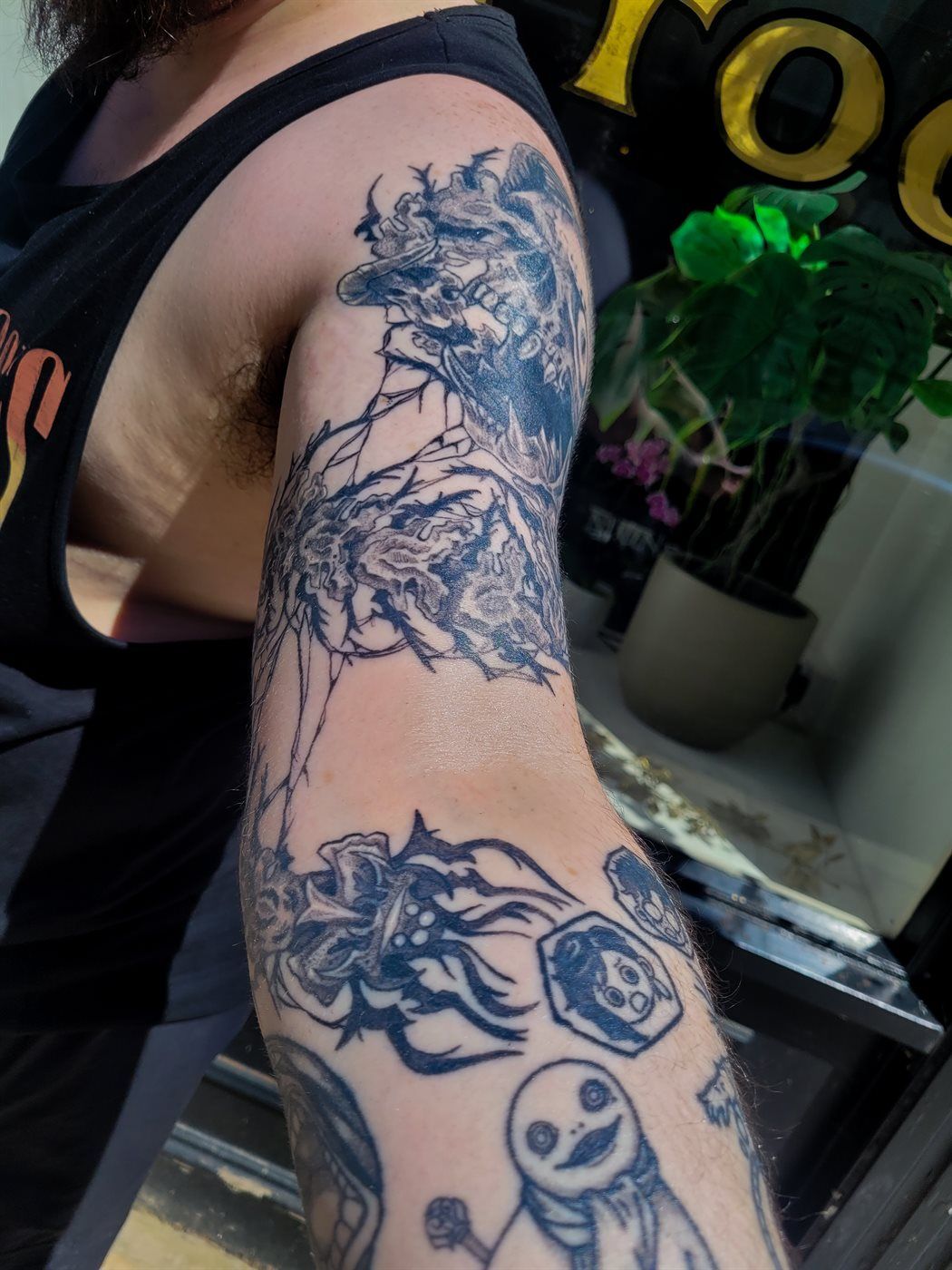 DEMON SKULL SLEEVE tattoo — horror, full arm — by Kayleigh Chaos, tattoo artist in Perth, Scotland