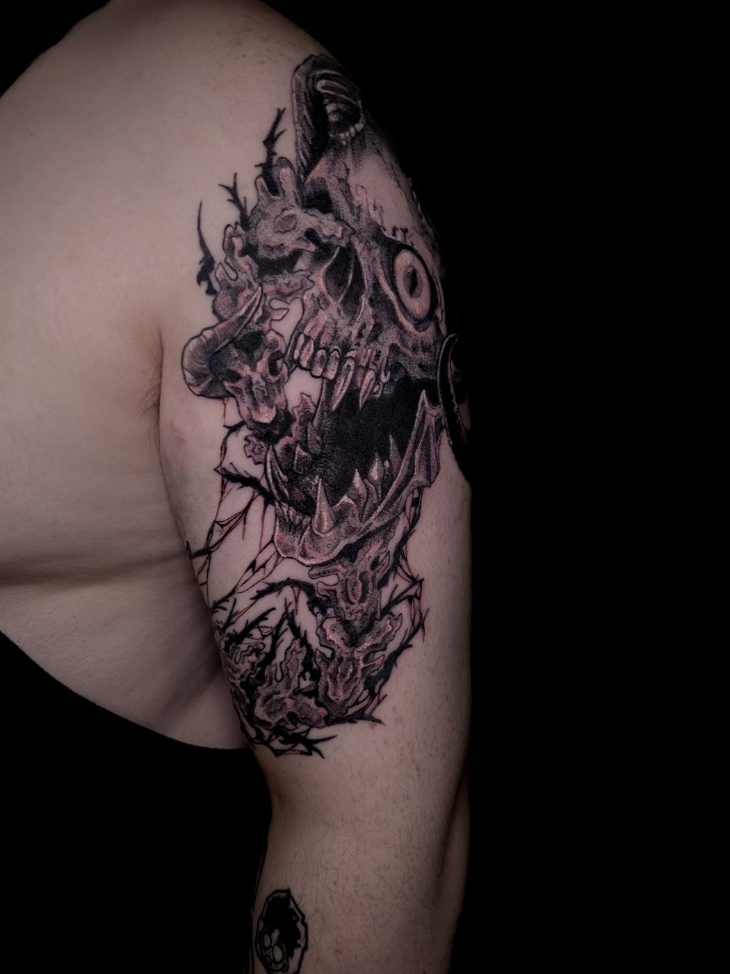 DEMON SKULL SLEEVE — SKULL tattoo — horror, shoulder — by Kayleigh Chaos, tattoo artist in Perth, Scotland