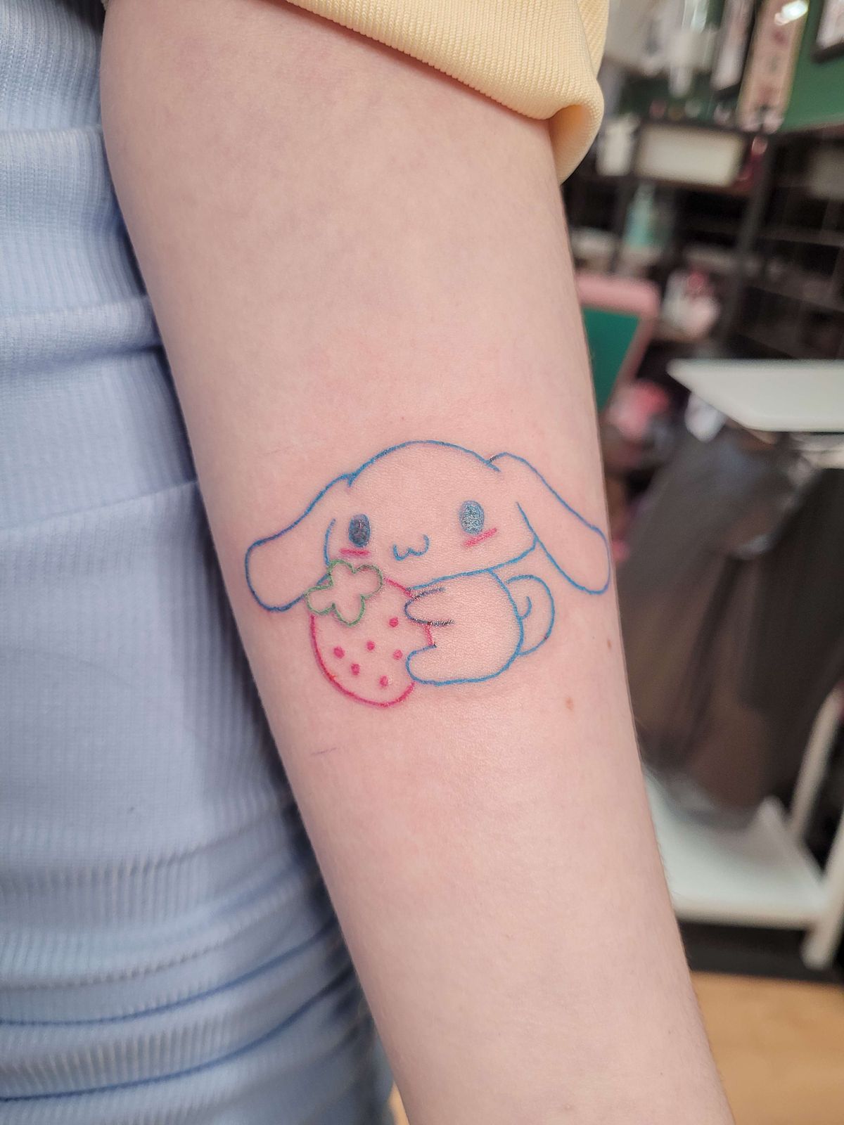 CINNAMOROLL tattoo — kawaii, arm — by Kayleigh Chaos, tattoo artist in Perth, Scotland
