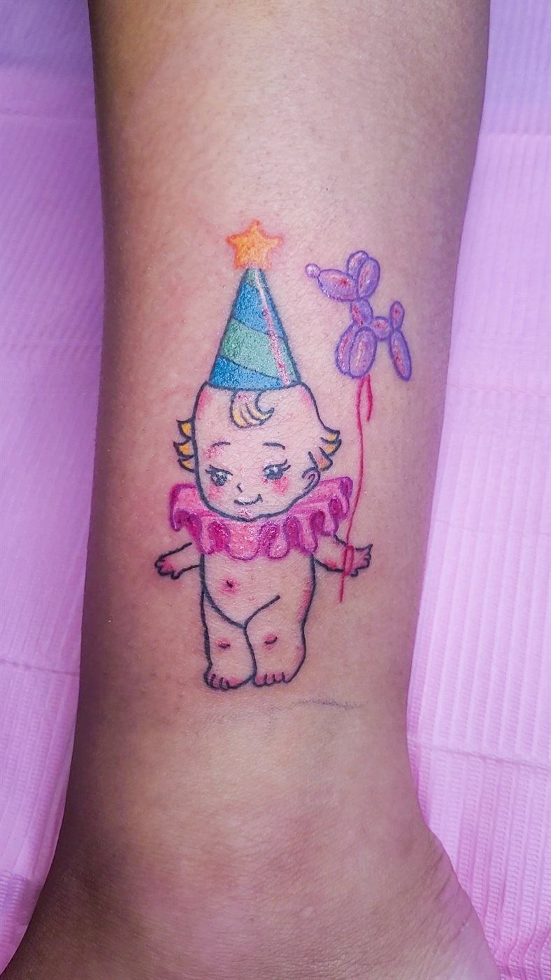 KEWPIE CLOWN tattoo — kawaii, ankle — by Kayleigh Chaos, tattoo artist in Perth, Scotland