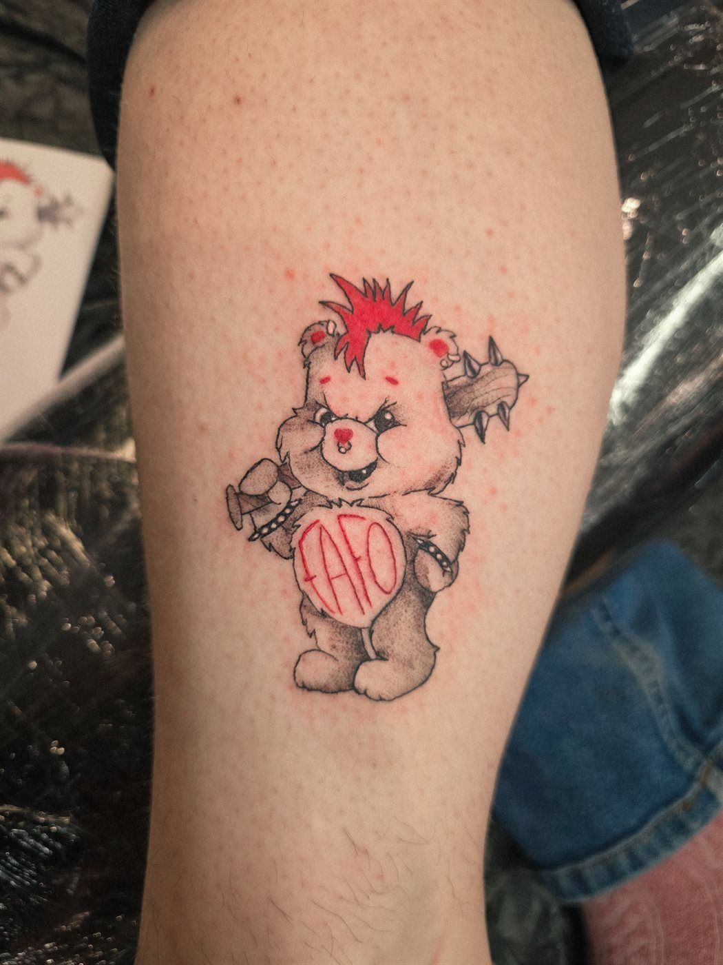 SCARE BEAR tattoo — cartoon, ankle — by Kayleigh Chaos, tattoo artist in Perth, Scotland