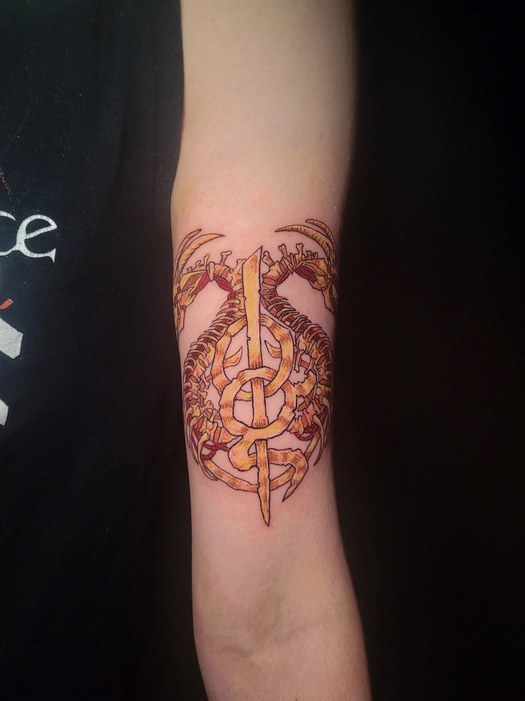 LAMB OF GOD tattoo — music, forearm — by Kayleigh Chaos, tattoo artist in Perth, Scotland