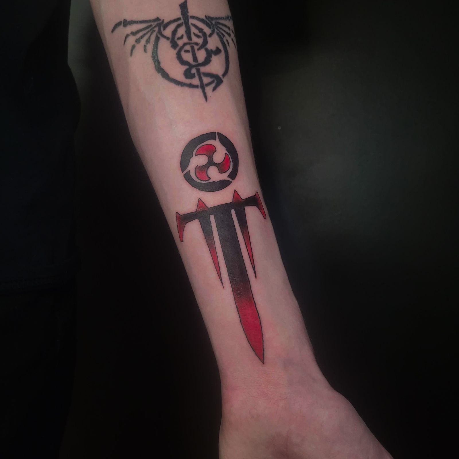 TRIVIUM tattoo — music, arm — by Kayleigh Chaos, tattoo artist in Perth, Scotland