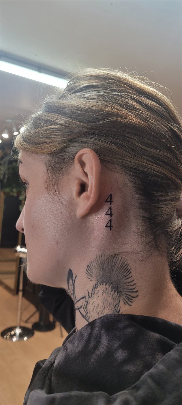 444 tattoo — script, behind ear — by Kayleigh Chaos, tattoo artist in Perth, Scotland
