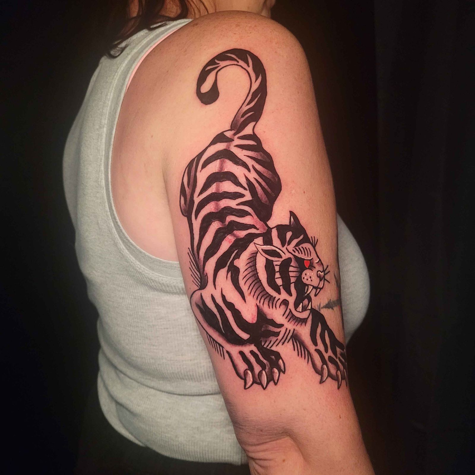TIGER tattoo — trad, arm — by Kayleigh Chaos, tattoo artist in Perth, Scotland