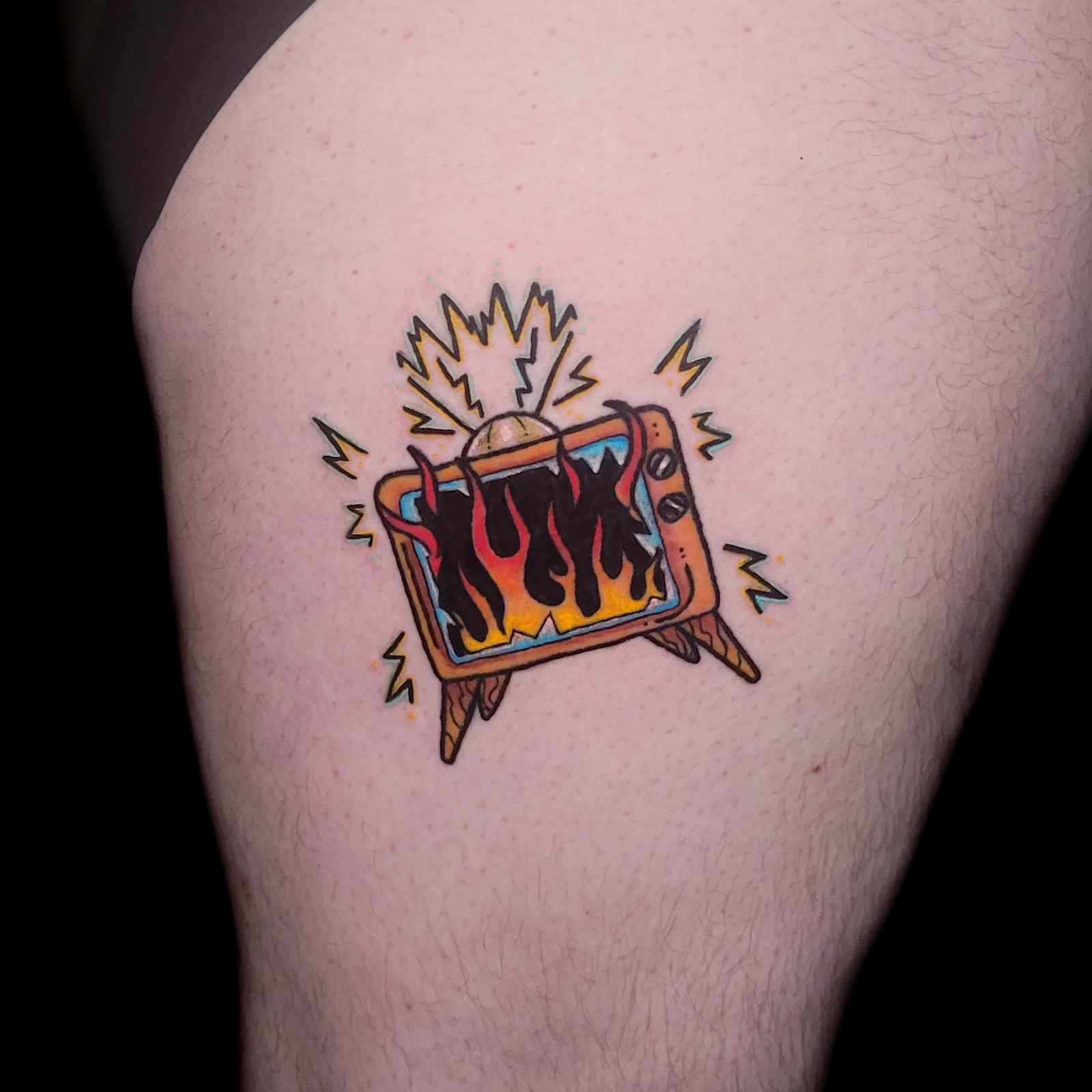 CRT TV tattoo — trad, thigh — by Kayleigh Chaos, tattoo artist in Perth, Scotland
